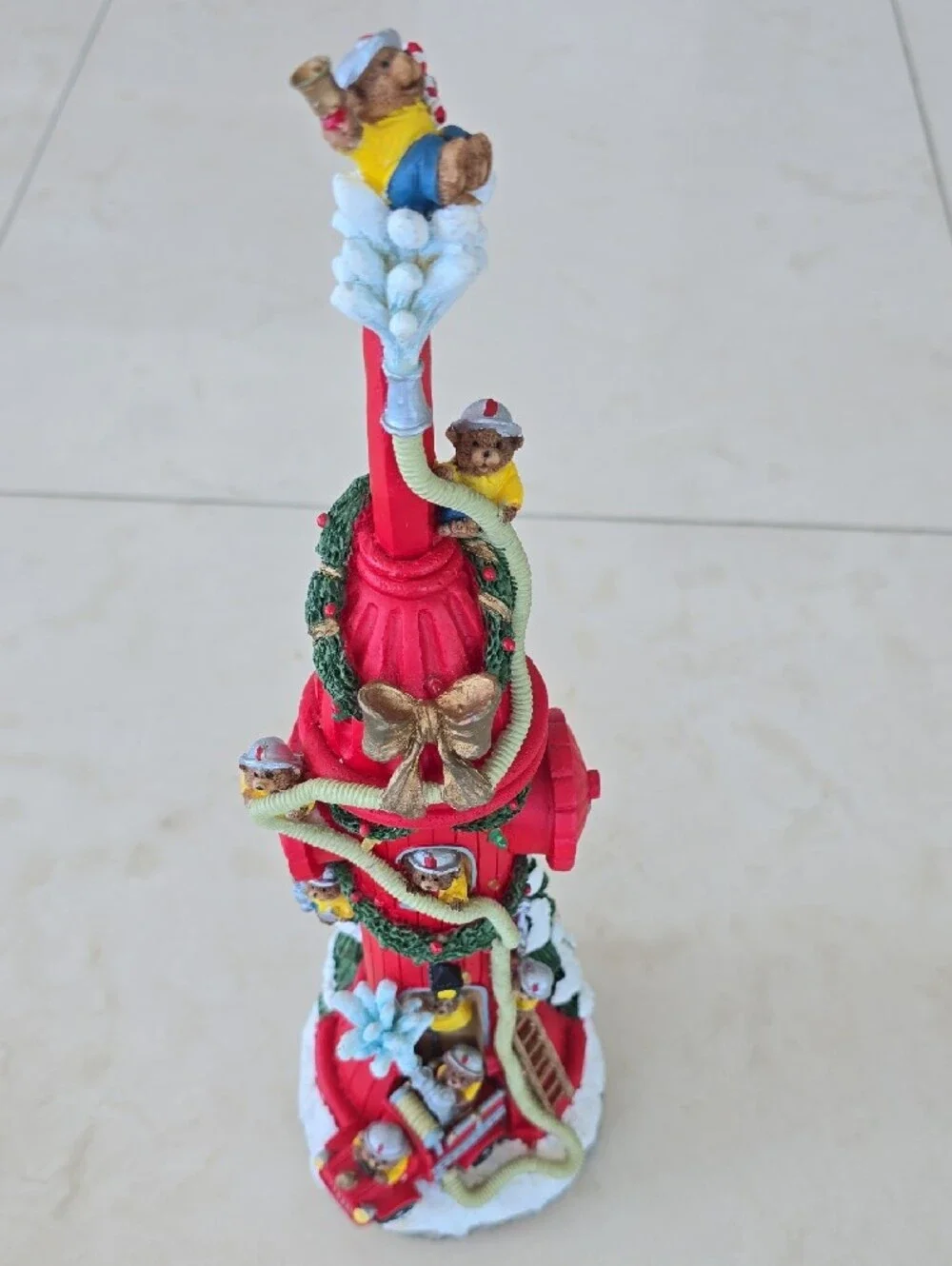 Lighted Firefighter Themed Holiday Pencil Musical Decoration - Red Fire Hydrant